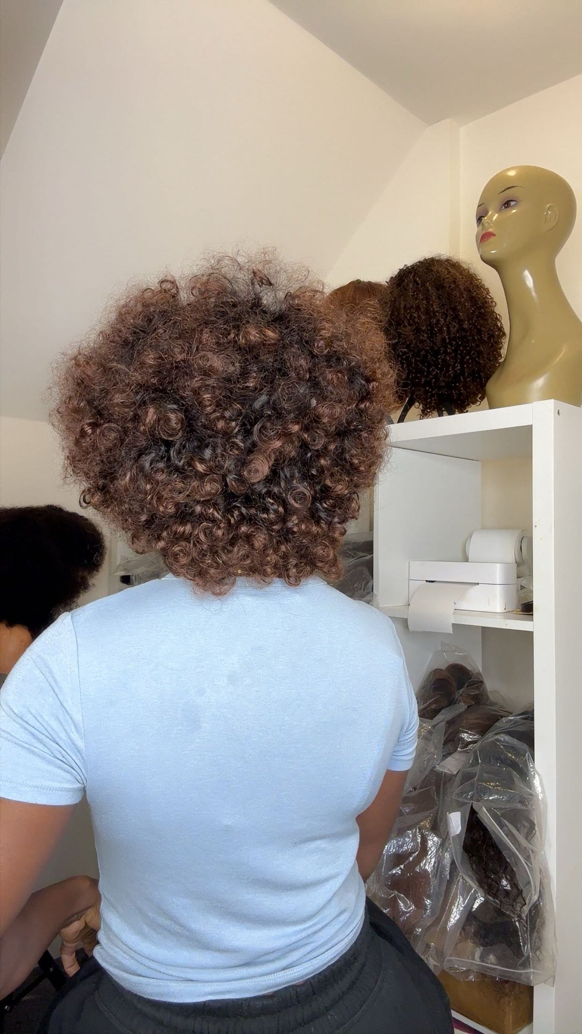Short Afro Wig with textured curls and natural-looking volume